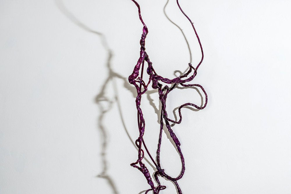 String artwork mounted to wall by Robert Schatz.
